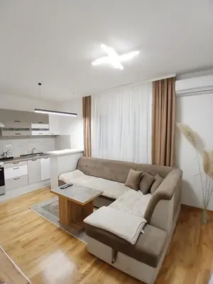 a living room with a couch and a table at Silencio in Banja Luka