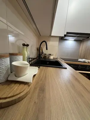 a kitchen with a sink and a bowl on a counter at Apartman Leo in Banja Luka