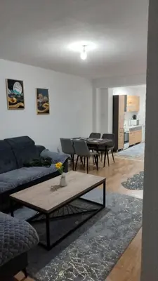 a living room with a couch and a table at Apartman Munir Zahirovič in Travnik