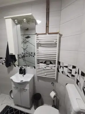 a small bathroom with a toilet and a sink at Sofyy in Banja Luka