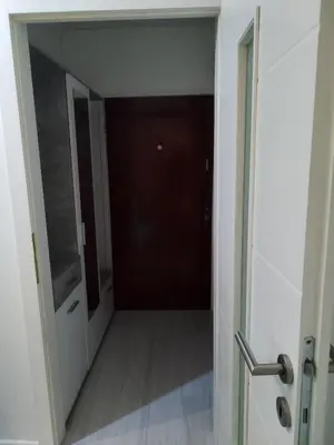 an open door to a hallway in aartmentartmentvenant at Apartman San in Bihać