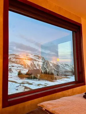 a window with a view of a snowy mountain at Villa Encian in Travnik