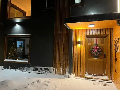 a building with a christmas wreath on the door at Villa Encian in Travnik