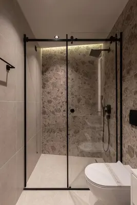 a shower stall in a bathroom with a toilet at Garni Hotel Galeria in Banja Luka