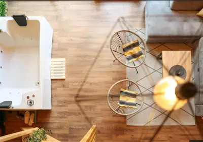 an overhead view of a living room with a table at Wellness Borealis in Tuzla