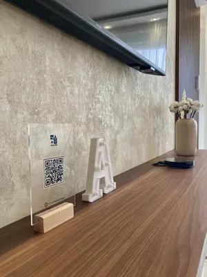 a room with a sign and a alphabet on the floor at Apartman Atrium Banja Luka in Banja Luka