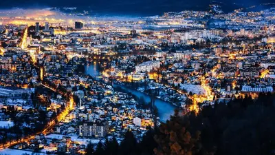 an aerial view of a city at night at Apartmani Kastel 4 in Hiseti
