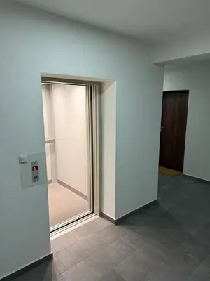 an empty room with a sliding glass door at Apartment Saturday in Travnik