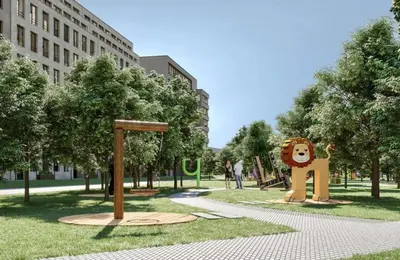 a park with a bear statue in the grass at Apartment 27 small in Banja Luka