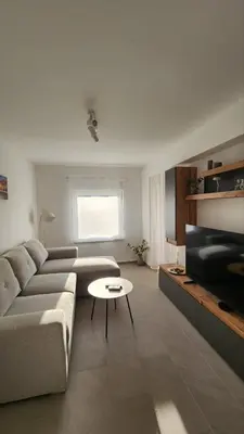 a living room with a couch and a table at Apartman Milica in Banja Luka
