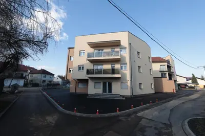 a tall building on the side of a street at Apartman Dentalux 3 in Banja Luka