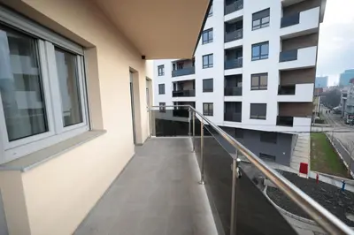 a balcony of a apartment building with a walkway at Apartman Dentalux 4 in Banja Luka