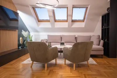 a living room with a couch and a table at Aleja Dua in Banja Luka