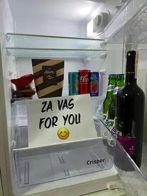 a refrigerator with a sign that says ya was for you at Apartman Royal 1 in Doboj