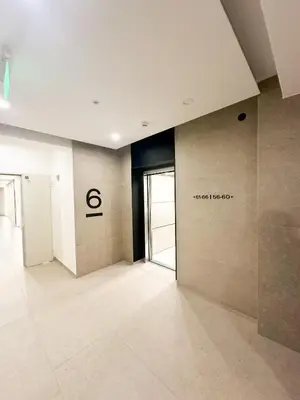 an empty room with a sign on the wall at KING - Apartment & SPA in Banja Luka