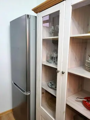 a kitchen with a stainless steel refrigerator at Apartman Borik in Banja Luka