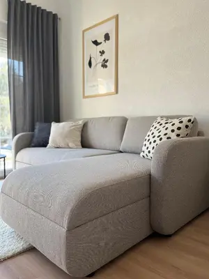 a gray couch in a living room with at Home Away From Home 2 in Jajce