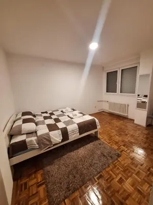 a bedroom with a bed in a room at Empress in Banja Luka