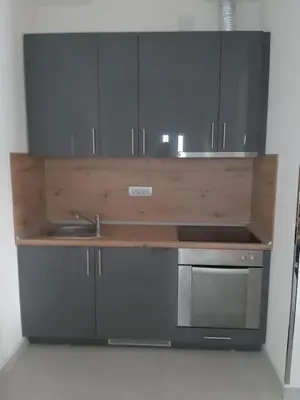 a kitchen with a sink and a microwave at Fest in Banja Luka