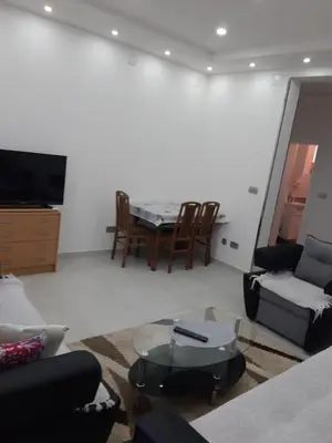 a living room with a couch and a table at Fest in Banja Luka