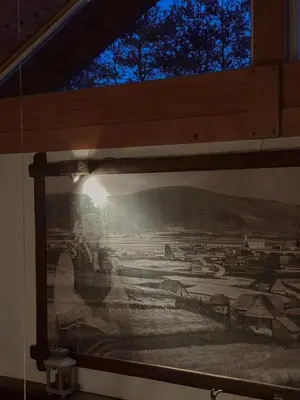 a picture of a painting on a wall at Planinska kuća Ema in Kupres