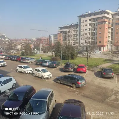 a bunch of cars parked in a parking lot at Industry in Banja Luka