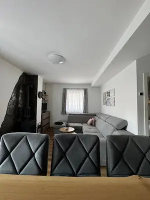 a living room with a couch and two chairs at Winter Nights Vlasic in Vlasic