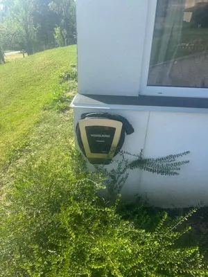 a toilet paper dispenser on the side of a house at Relax House in Banja Luka