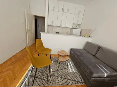 a living room with a couch and two chairs at Stan na dan G & V in Prijedor