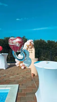 a group of balloons sitting next to a pool at Vikendica Elenda Banja Luka in Laktaši