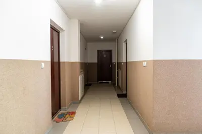 an empty hallway with a door and a hallwayngth at Gradina Stan na Dan in Doboj