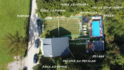 an aerial view of a yard with a house at Vikendica VILLA A1 in Banja Luka