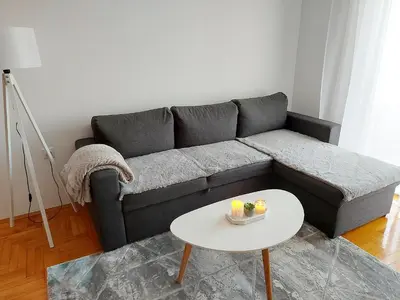 a living room with a couch and a table at Apartman Stella Banja Luka in Krndija