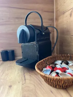 a basket of pins next to a bag and a basket of pins at Apartman Vrućica view in Teslić