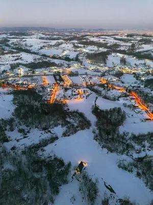 an aerial view of a city in the snow at Hygge house in Banja Luka