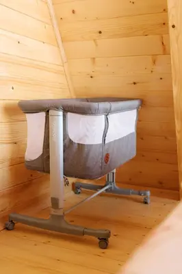 an office chair in a room with a wooden ceiling at Vikendica miRAJ Manjaca in Gornje Ratkovo