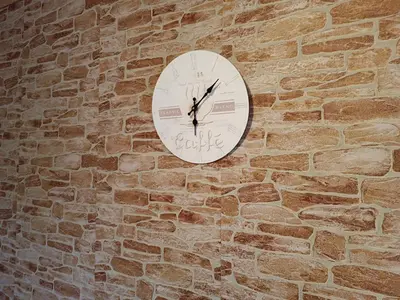 a clock on the side of a brick wall at Relaks dream in Vlasic