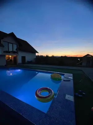 a swimming pool with two life rings on it at Apartman HADŽILUK in Bugojno