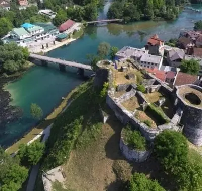an aerial view of a house next to a river at Ferienwohnung Sabina in Bosanska Krupa