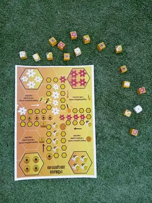 a game board on the ground with blocks on the grass at Apartman MED in Doboj