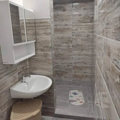 a bathroom with a sink and a mirror at Luxury Villa Tale - Una in Ripač