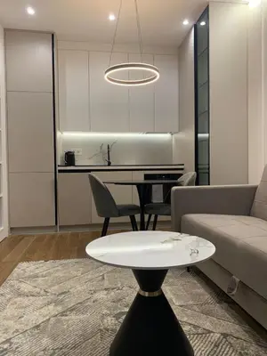 a living room with a couch and a table at Apartman LUAN5 centar in Banja Luka