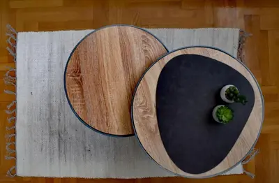 two wooden plates with broccoli on top of a table at ViGoSt in Banja Luka