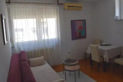 a living room with a couch and a table at ViGoSt in Banja Luka
