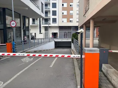 a police tape on a street next to a building at Apartman 888 in Banja Luka
