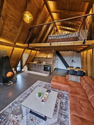 a living room with a couch and a table at Luxury Villa Mašić in Čardaci