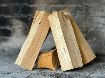 two pieces of wood sitting next to each other at Kuća za odmor- Fojnica in Tješilo