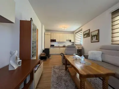 a living room with a couch and a table at Kuća za odmor- Fojnica in Tješilo