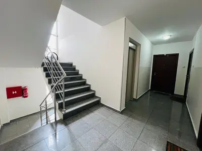 a staircase in a building with a stair case at Apartman Tara 11 in Banja Luka