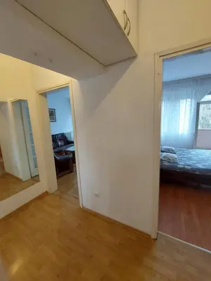 an empty room with a bedroom and a bed at Index 3 in Banja Luka
